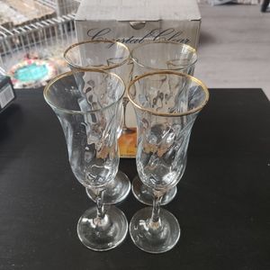 A set of 4 crystal champagne glasses